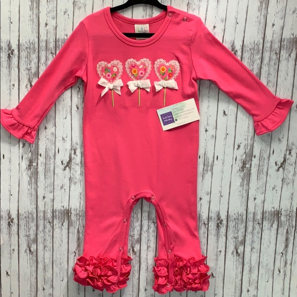 Pink ruffled romper